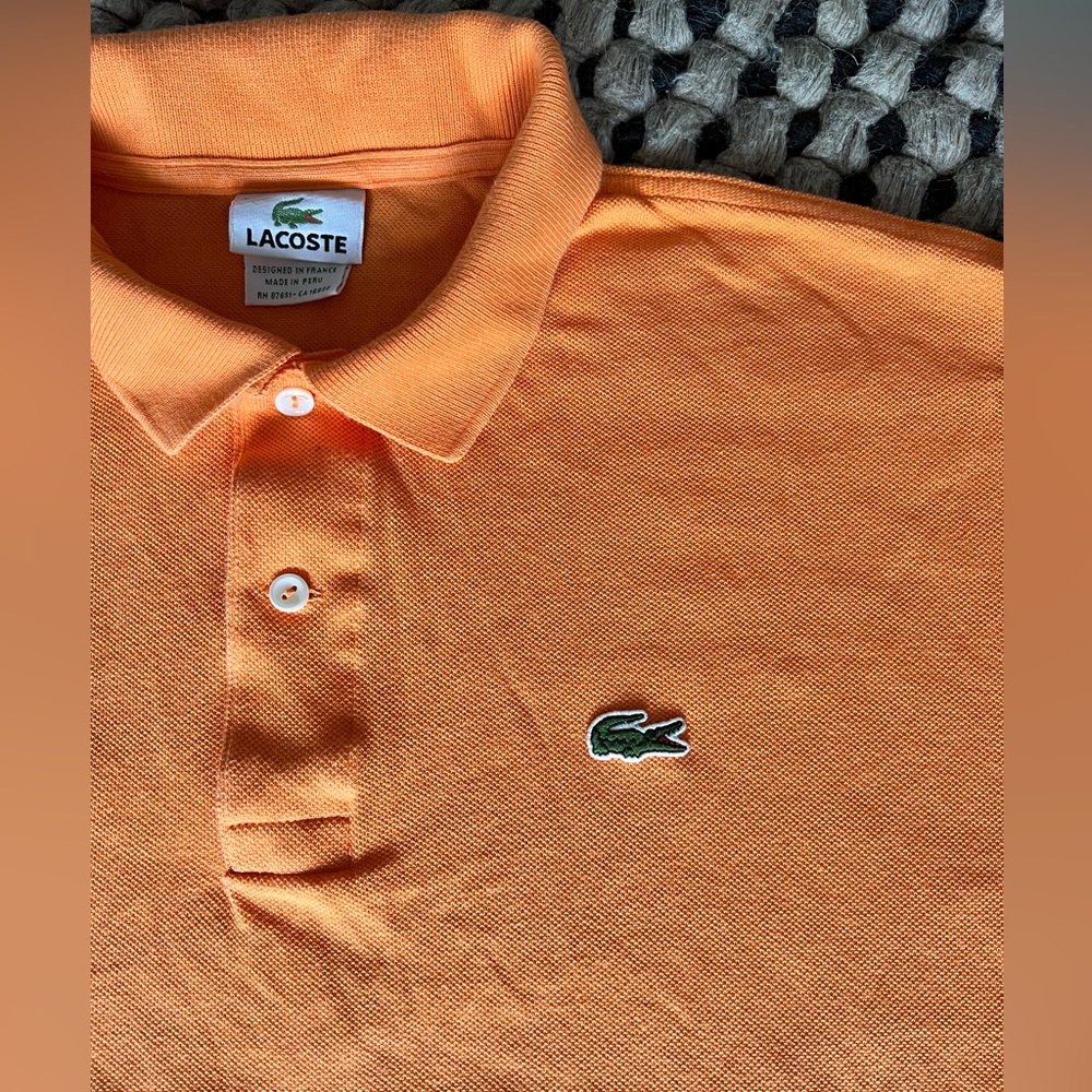 Lacoste , bright orange short sleeve polo shirt . Size 5 (L)-EUC